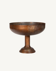 Metal pedestal bowl on a white background