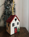 House Red Roof and Christmas tree in front
