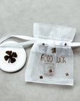 Hoja de trébol de moneda de la suerte