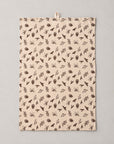 Tea towel with brown cones and twigs
