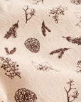 Tea towel with brown cones and twigs