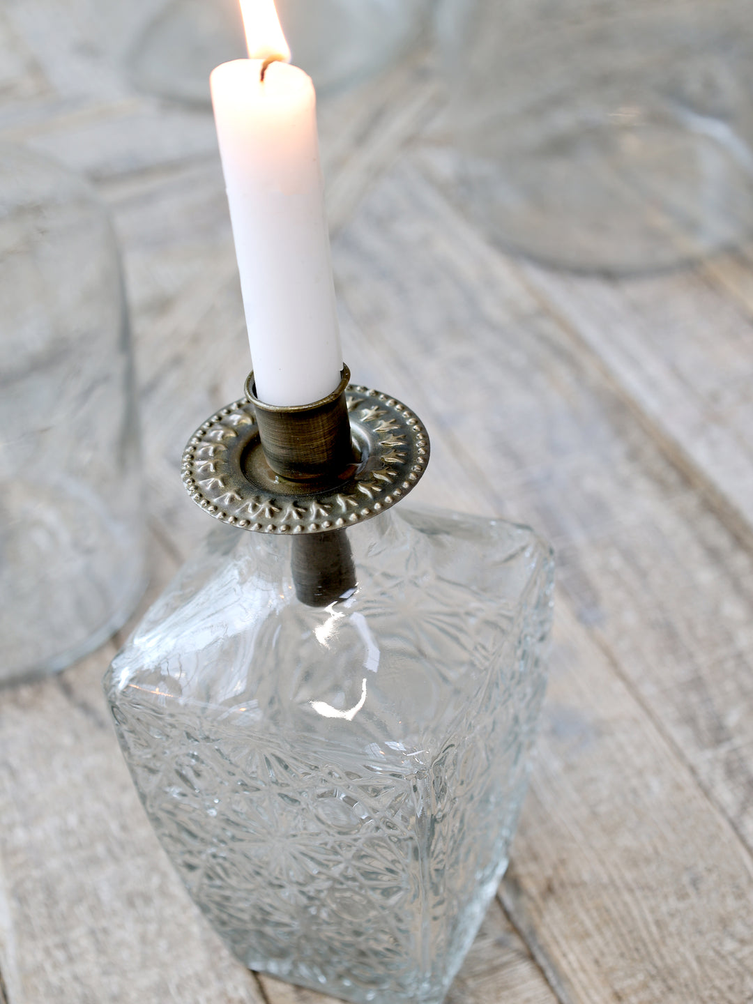 Candle holder for bottle