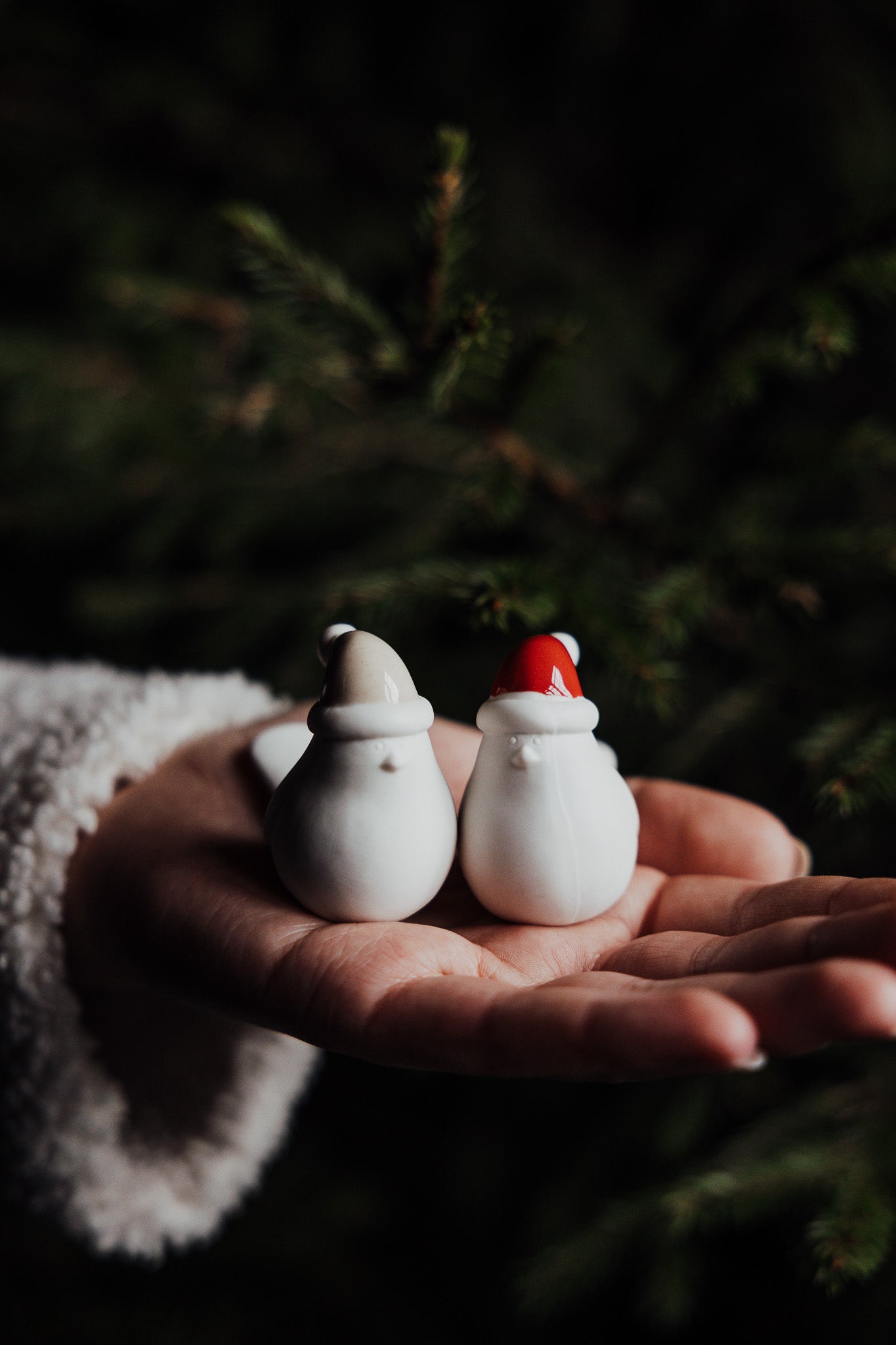 Ceramic bird with red hat
