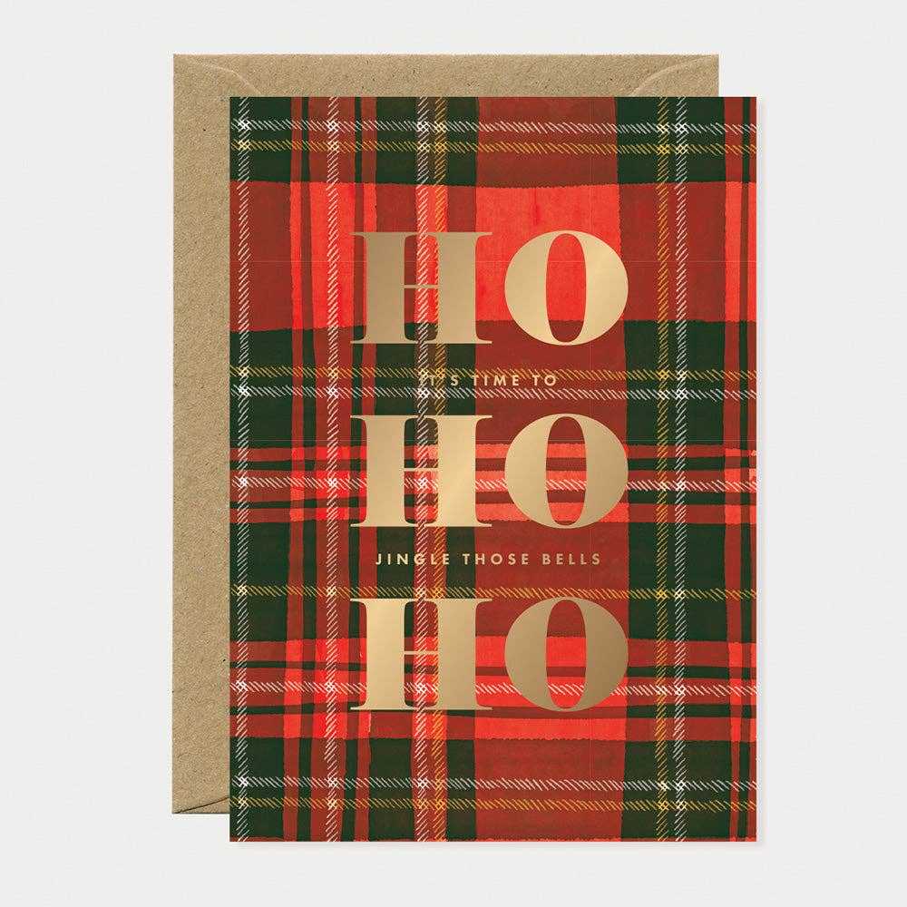 Red and green plaid card with gold text on a white background