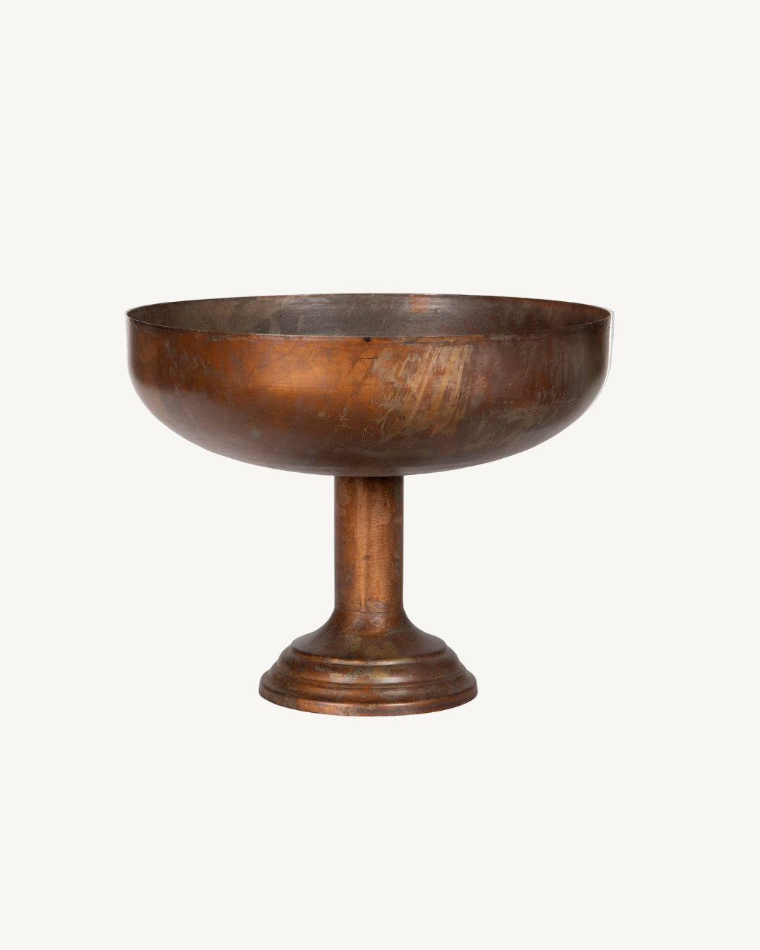Metal pedestal bowl on a white background
