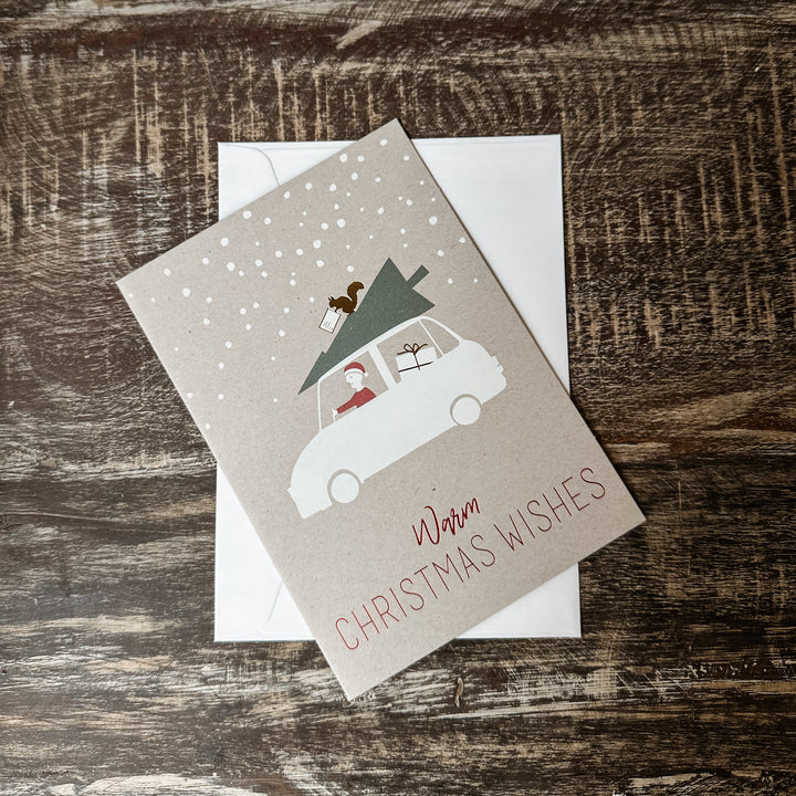 Tarjeta navideña para el coche Cálidos deseos navideños.