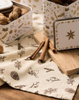 Tea towel with brown cones and twigs