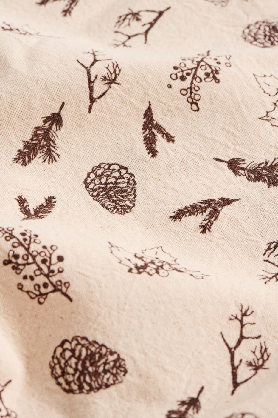 Tea towel with brown cones and twigs