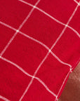 Cushion cover with red checks