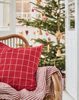 Cushion cover with red checks